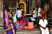 Worship and puja offerings inside the Swamimalai temple.